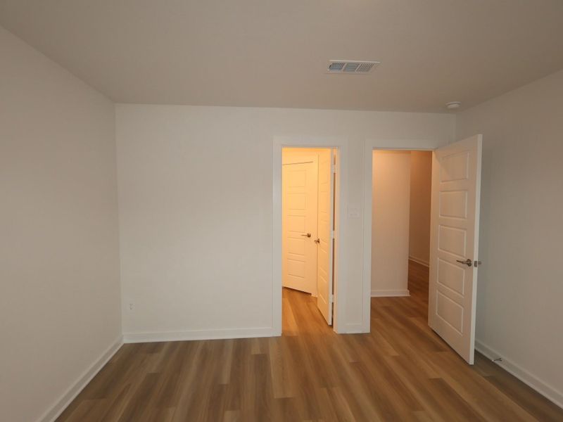 Spacious, unfurnished interior of a new home in Pinewood at Grand Texas, New Caney (Image 23).