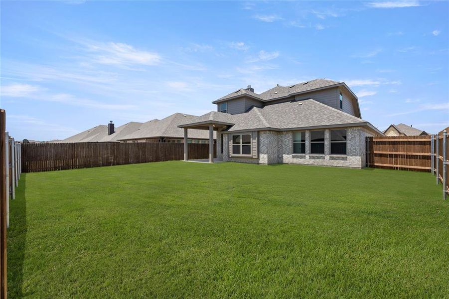 Front exterior of a new home in The Parks at Panchasarp Farms - Phase 2, Burleson, TX, highlighting curb appeal (Image 25). Front exterior of a new home in The Parks at Panchasarp Farms - Phase 2, Burleson, TX, highlighting curb appeal (Image 25).