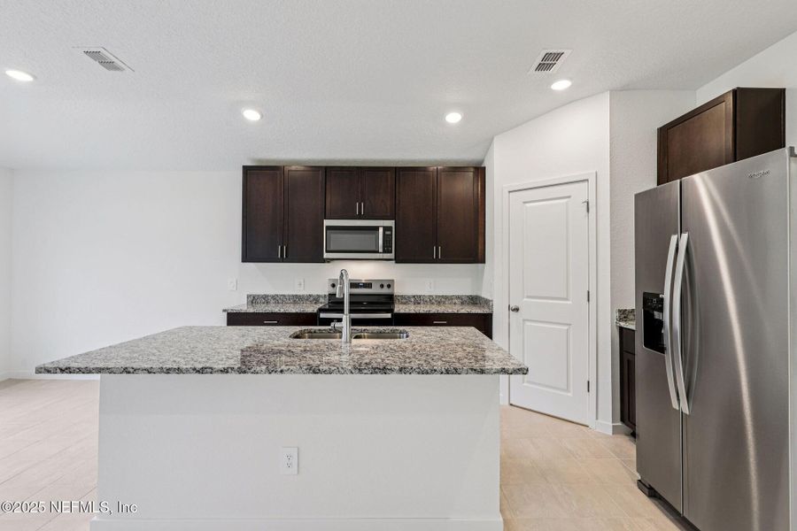 Furnished interior view inside a new home in Kings Preserve, Jacksonville (Image 8). Furnished interior view inside a new home in Kings Preserve, Jacksonville (Image 8).
