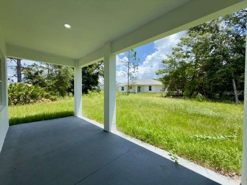 Exterior details and patio area of a home in , Ocala (Image 33).