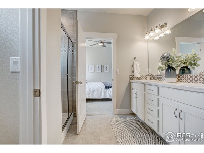 Furnished interior view inside a new home in The Lakes at Centerra - The Shores, Loveland (Image 17).