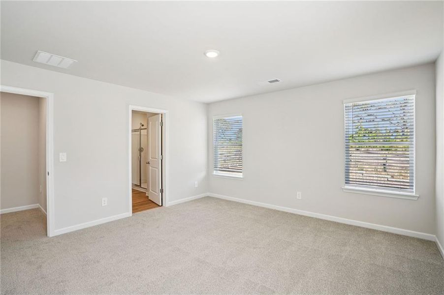 Spacious, unfurnished interior of a new home in Hawthorne Station, College Park (Image 36).