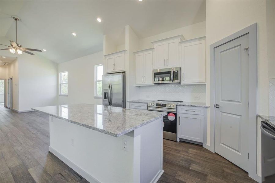 View from kitchen showing living area