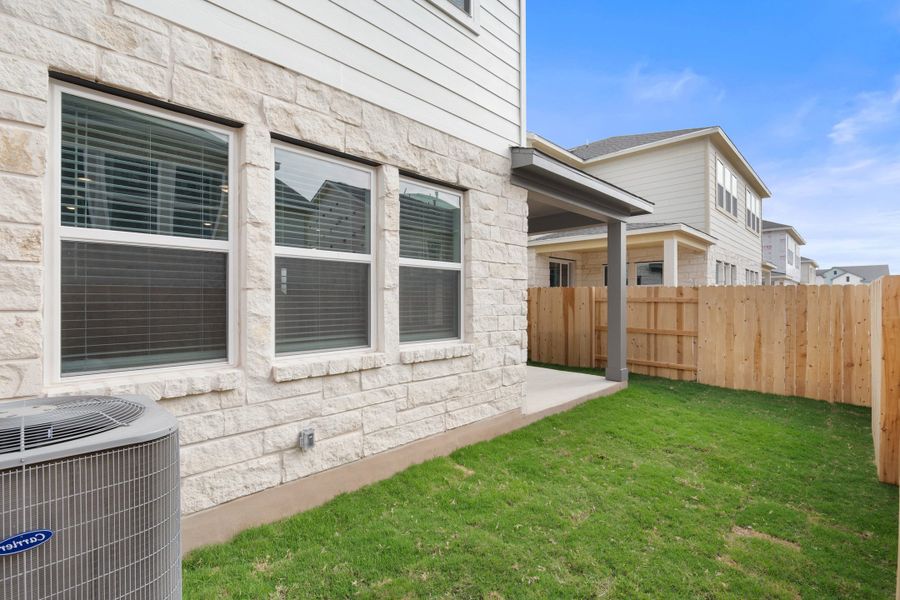 Exterior details and patio area of a home in Park Central, Georgetown (Image 29).