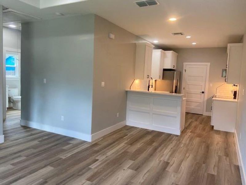 A well-appointed kitchen featuring a modern layout and abundant cabinetry. A well-appointed kitchen featuring a modern layout and abundant cabinetry.