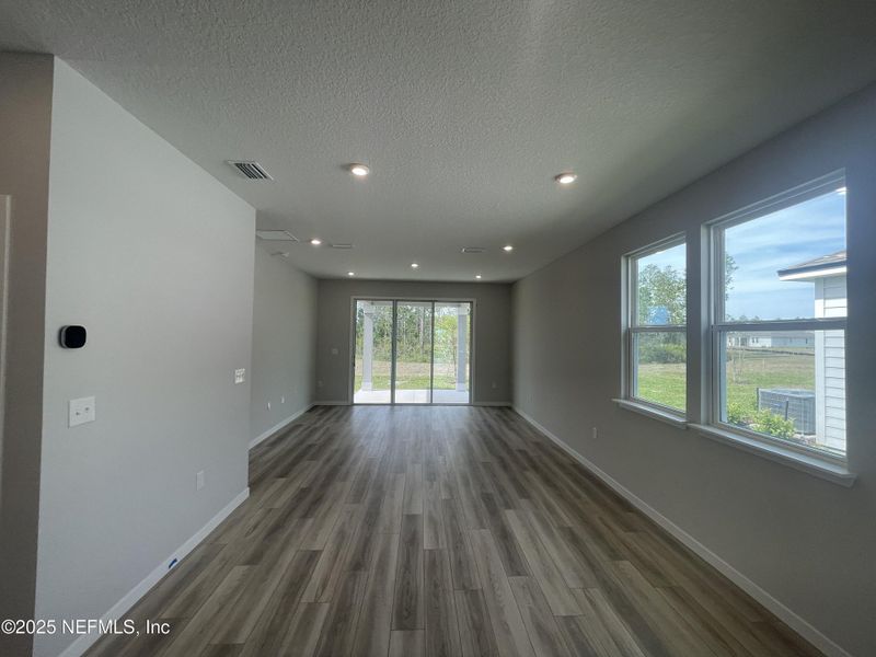 Spacious, unfurnished interior of a new home in Palm Series at Seminole Palms, Palm Coast (Image 33).