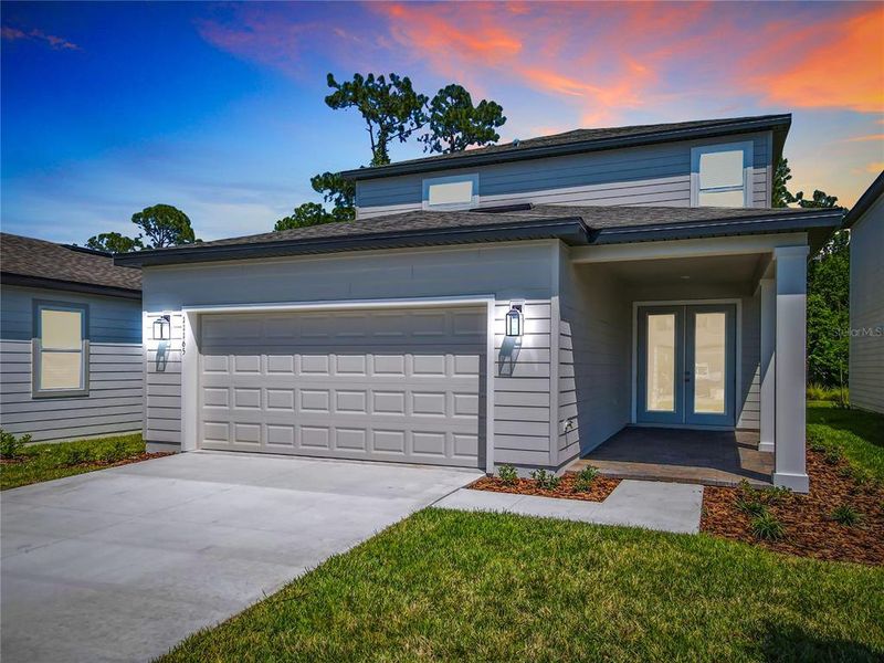 Front exterior of a new home in , Winter Garden, FL, highlighting curb appeal (Image 22).