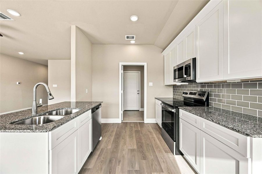 Furnished interior view inside a new home in Crockett Meadows, Conroe (Image 6).