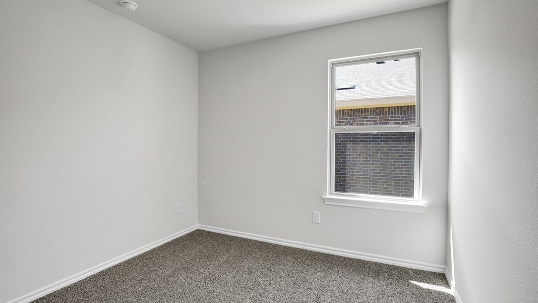Spacious, unfurnished interior of a new home in Stonewyck Farms, Ennis (Image 15).