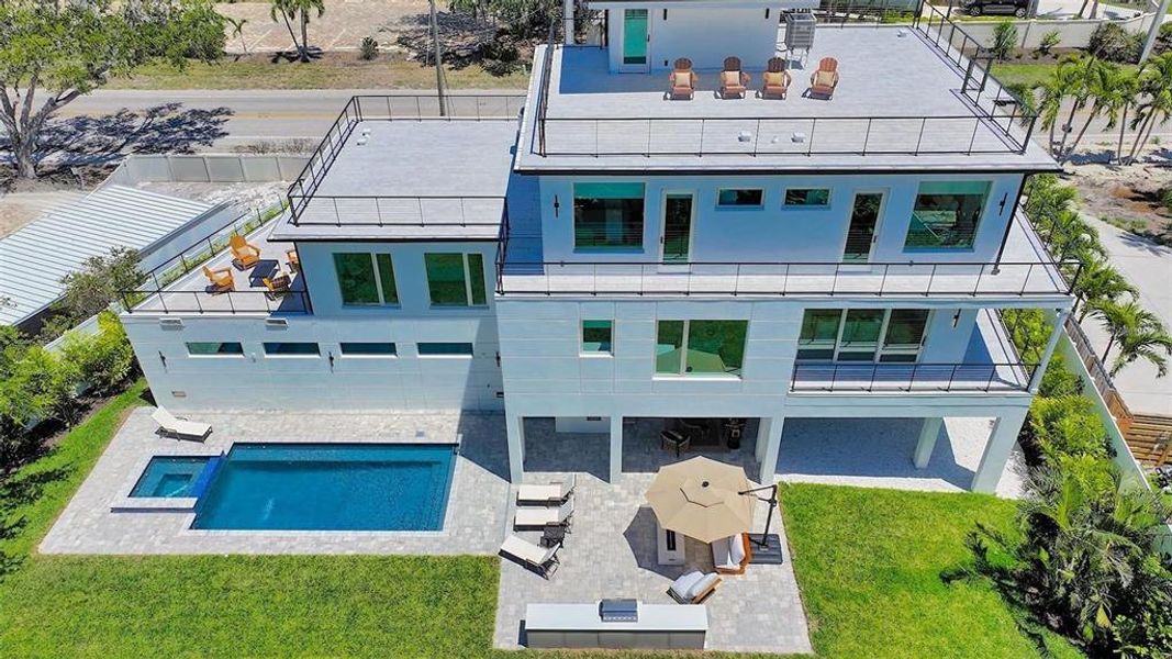 Exterior details and patio area of a home in , Sarasota (Image 25).