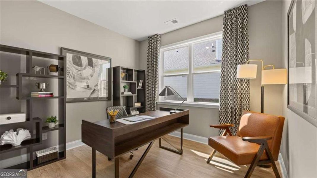Furnished interior view inside a new home in Oak Ridge Meadows - Active Adult, Locust Grove (Image 12).
