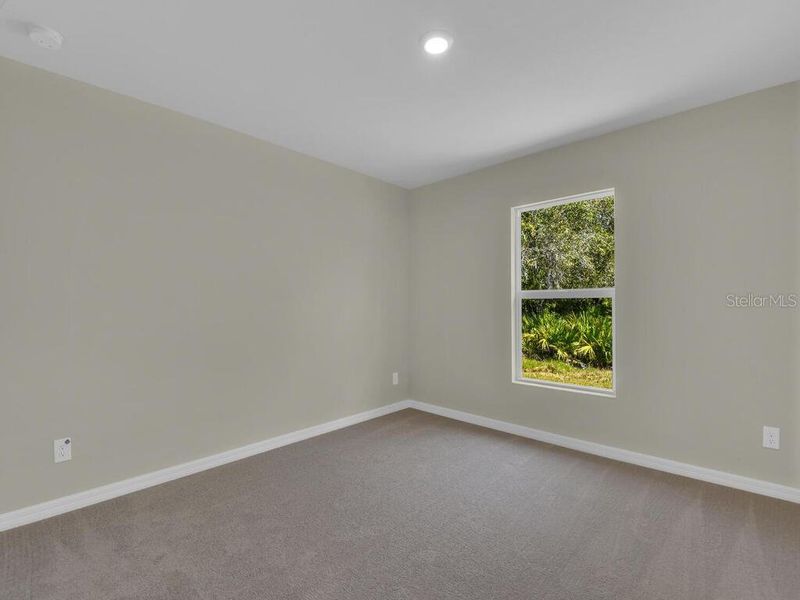 Spacious, unfurnished interior of a new home in , Port Charlotte (Image 8).