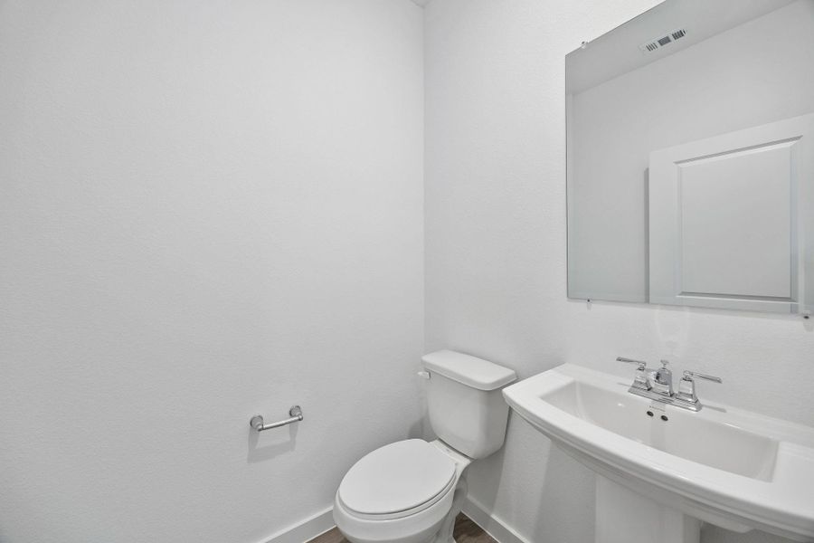Furnished interior view inside a new home in Ellerden, Tomball (Image 7).