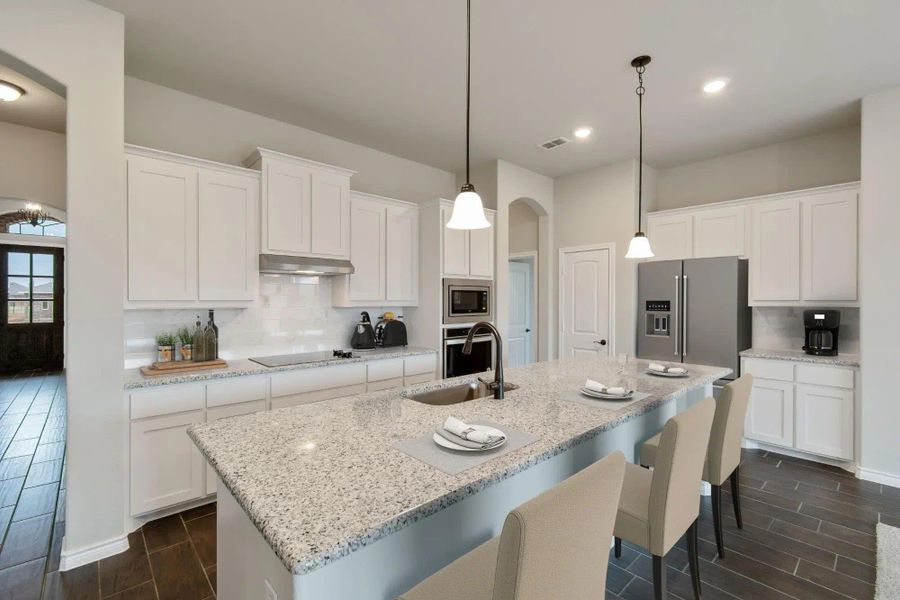 Kitchen | Concept 2671 at Mockingbird Hills in Joshua, TX by Landsea Homes