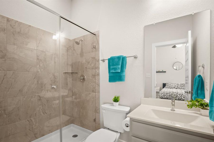 From the sleek vanity to the pristine walk-in shower, every detail in this bathroom reflects quality craftsmanship and attention to detail.