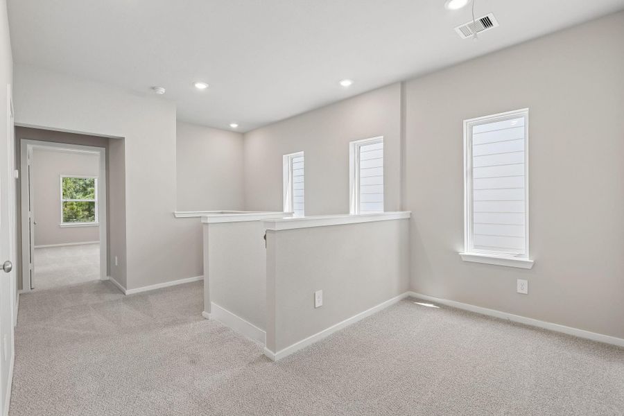 Spacious, unfurnished interior of a new home in Pinewood Trails - City Series, Atascocita (Image 27).