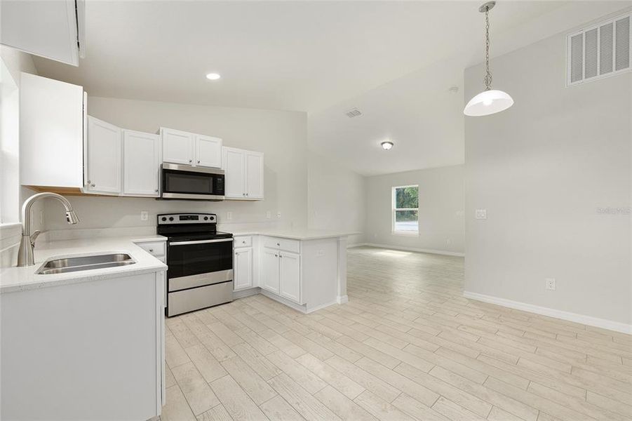 Furnished interior view inside a new home in , Ocala (Image 6).