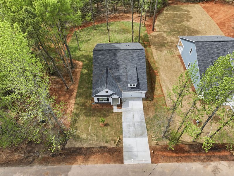 Front exterior of a new home in Broadway Lake, Anderson, SC, highlighting curb appeal (Image 21).