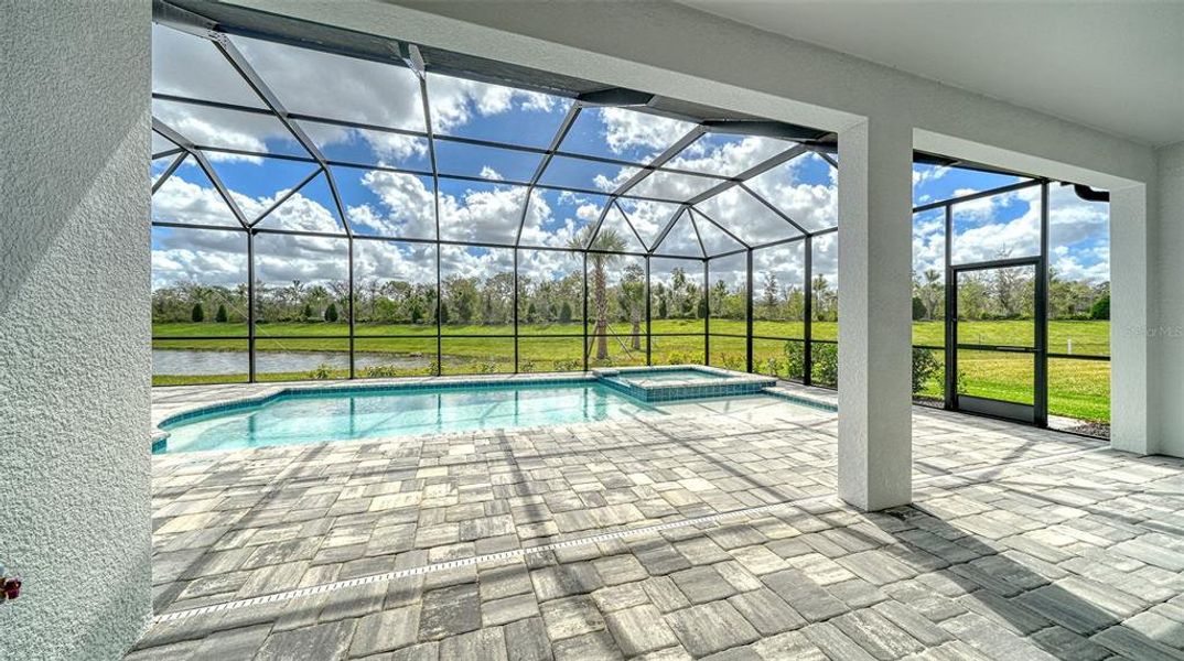 Exterior details and patio area of a home in Palm Grove, Lakewood Ranch (Image 25).