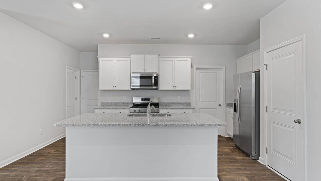 Furnished interior view inside a new home in Pine Hills at Cane Bay, Summerville (Image 4). Furnished interior view inside a new home in Pine Hills at Cane Bay, Summerville (Image 4).