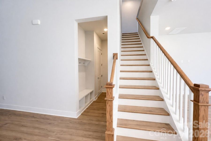 LVP Steps & Dropzone next to 3-Car Garage Entrance