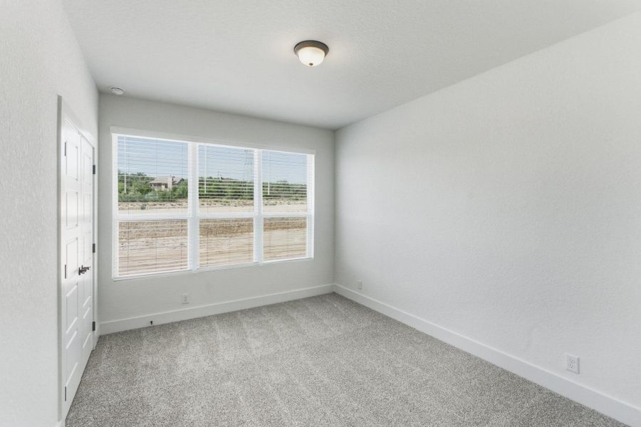 Spacious, unfurnished interior of a new home in Centero at Stone Oak, San Antonio (Image 32).