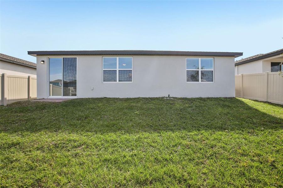 Exterior details and patio area of a home in Villamar - Signature Series, Winter Haven (Image 21).