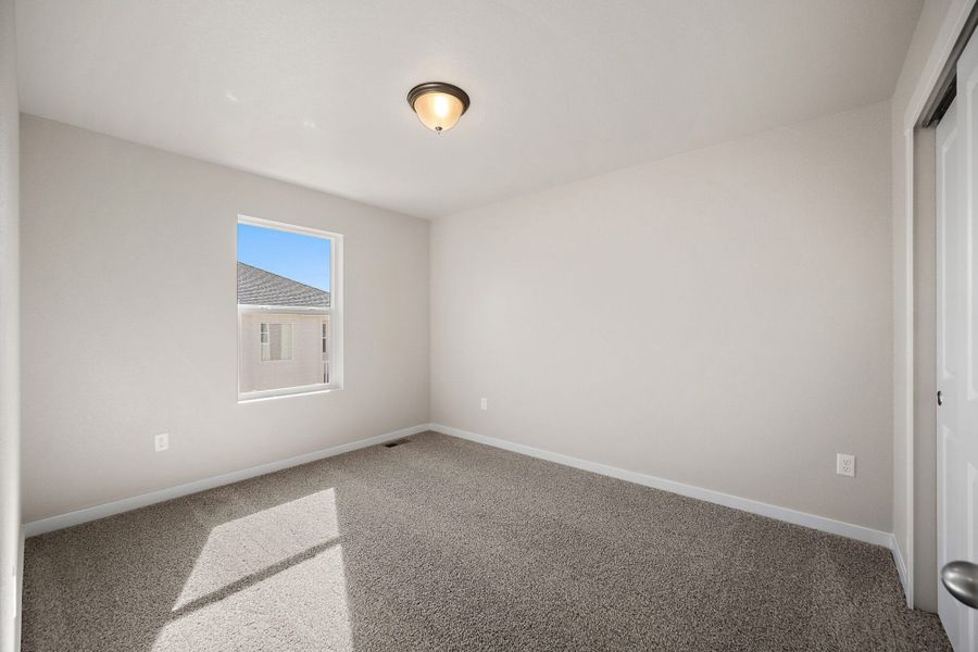 Spacious, unfurnished interior of a new home in Ridge at Lorson Ranch, Colorado Springs (Image 31).