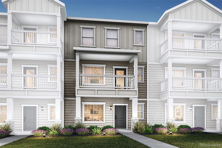 Front exterior of a new home in Evergreen Ridge, Colorado Springs, CO, highlighting curb appeal (Image 1). Front exterior of a new home in Evergreen Ridge, Colorado Springs, CO, highlighting curb appeal (Image 1).