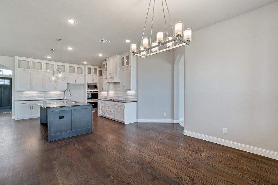 Nook & Kitchen | Concept 3634 at Hidden Creek Estates in Van Alstyne, TX by Landsea Homes