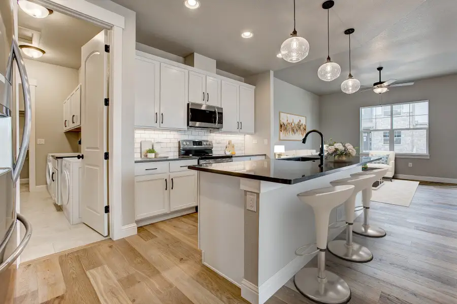 Representative furnished interior of a home built from the The Columbine by Landmark Homes in Country Farms Village - The Cottages, Windsor (Image 3).