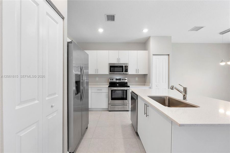 Furnished interior view inside a new home in , Coral Springs (Image 14).