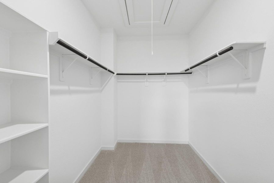 Primary walk-in closet (*Photo not of actual home and used for illustration purposes only.)