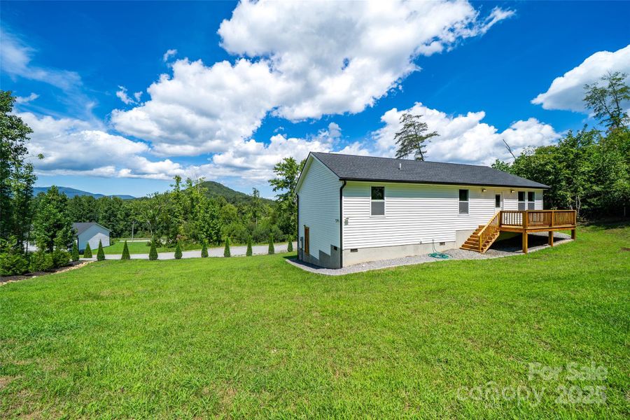 Front exterior of a new home in , Old Fort, NC, highlighting curb appeal (Image 14).