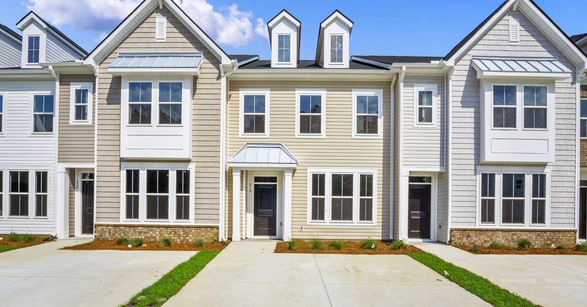 Front exterior of a new home in Parkview, Myrtle Beach, SC, highlighting curb appeal (Image 1). Front exterior of a new home in Parkview, Myrtle Beach, SC, highlighting curb appeal (Image 1).