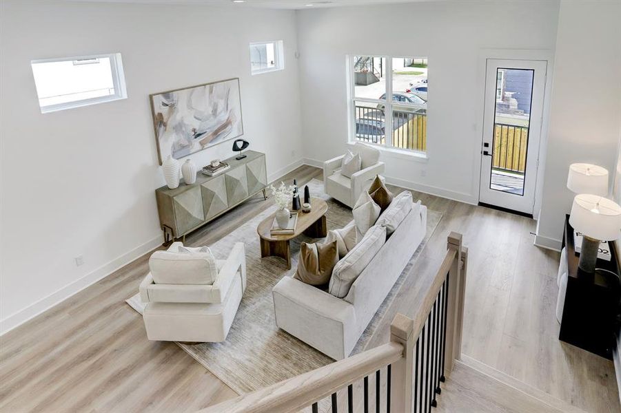 Looking down from the stairs to living area