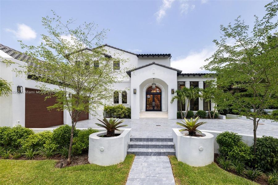 Front exterior of a new home in , Miami Beach, FL, highlighting curb appeal (Image 25). Front exterior of a new home in , Miami Beach, FL, highlighting curb appeal (Image 25).