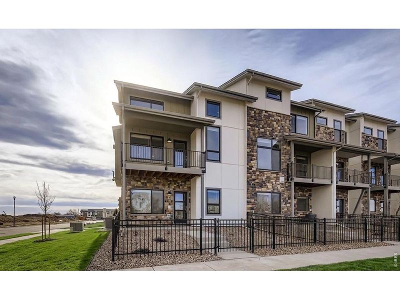 Front exterior of a new home in Northfield, Fort Collins, CO, highlighting curb appeal (Image 2). Front exterior of a new home in Northfield, Fort Collins, CO, highlighting curb appeal (Image 2).