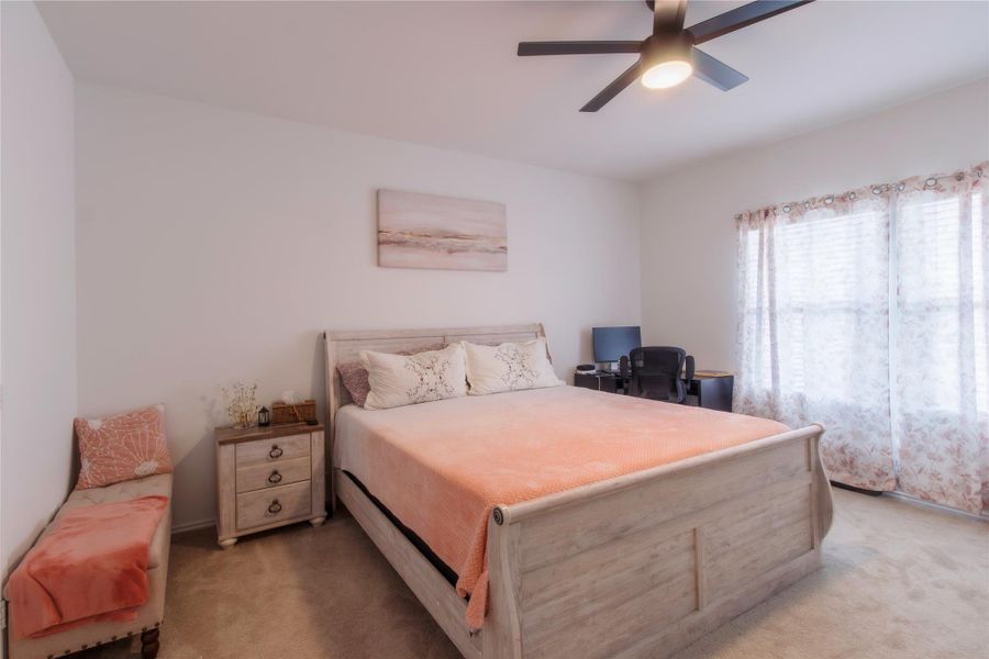 Spacious owner's suite with elegant design and plenty of room to relax.