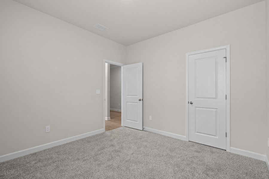 Spacious, unfurnished interior of a new home in Waterside - Coastline Series, Longs (Image 29). Spacious, unfurnished interior of a new home in Waterside - Coastline Series, Longs (Image 29).