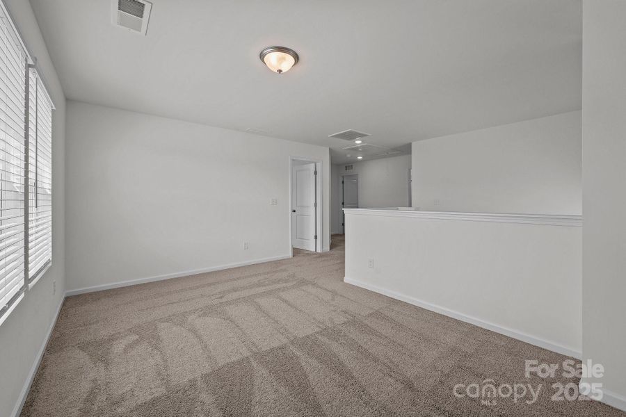 Spacious, unfurnished interior of a new home in Piper Landing, Concord (Image 32).