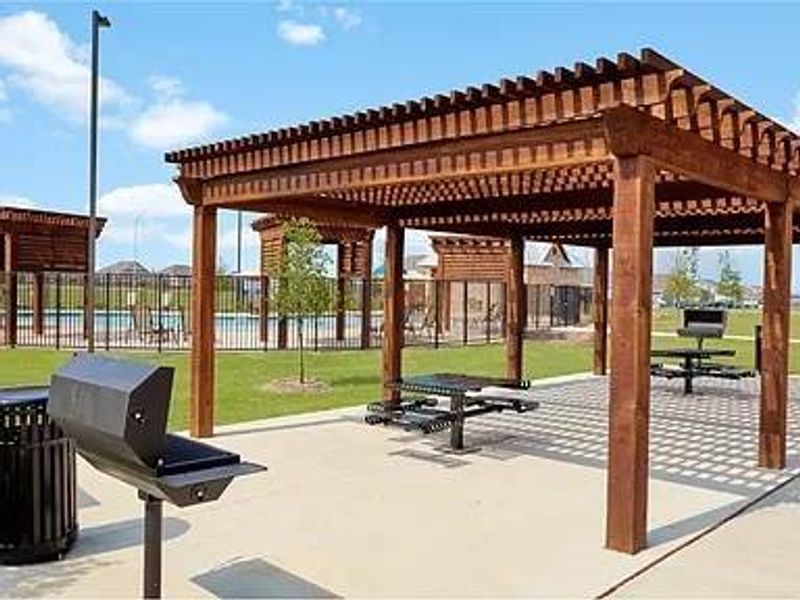 View of nearby features featuring a pergola and a yard