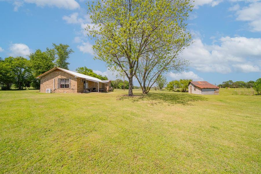 Front exterior of a new home in , Leesburg, TX, highlighting curb appeal (Image 21).