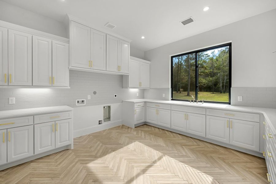 Spacious separate prep kitchen/pantry offering abundant storage, extended counter space, and convenient organization for everyday use and entertaining. Spacious separate prep kitchen/pantry offering abundant storage, extended counter space, and convenient organization for everyday use and entertaining.