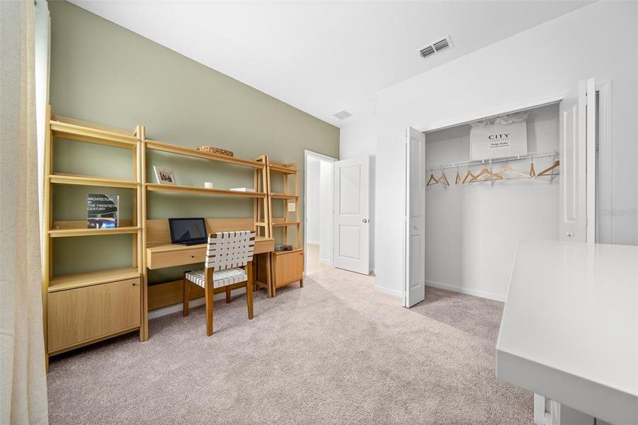 Furnished interior view inside a new home in Pioneer Ranch: Pioneer Ranch 60's, Ocala (Image 31).