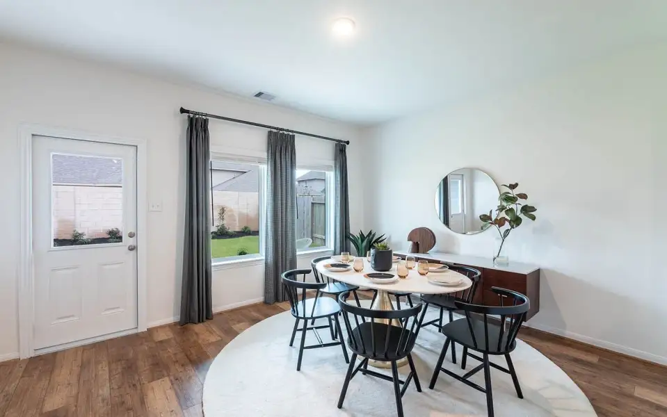 Representative furnished interior of a home built from the Ash by CastleRock Communities in Firefly Cove, Lago Vista (Image 10).