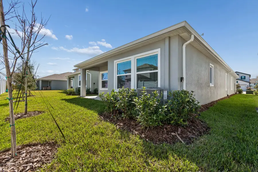 Exterior details and patio area of a home in Chapel Crossings - Garden Series, Wesley Chapel (Image 3).