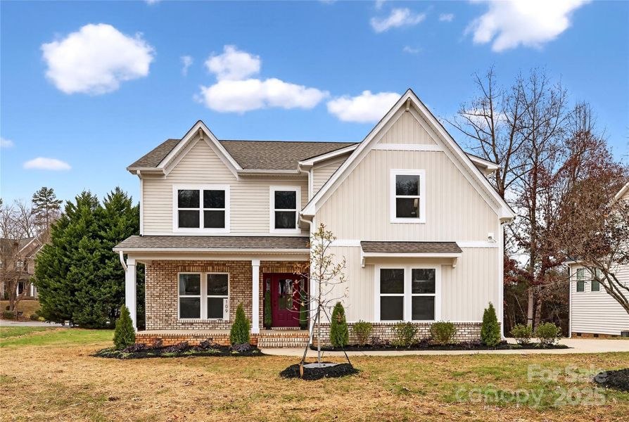 Front exterior of a new home in , Mooresville, NC, highlighting curb appeal (Image 2).