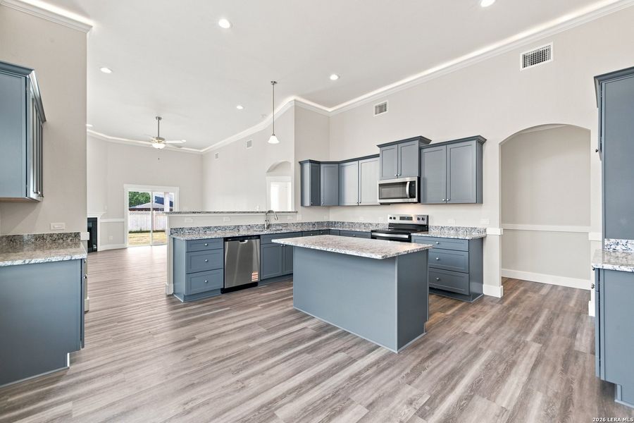 Furnished interior view inside a new home in Las Palomas Country Club Estates, La Vernia (Image 13).