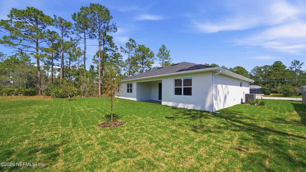 Exterior details and patio area of a home in , Palm Coast (Image 28).
